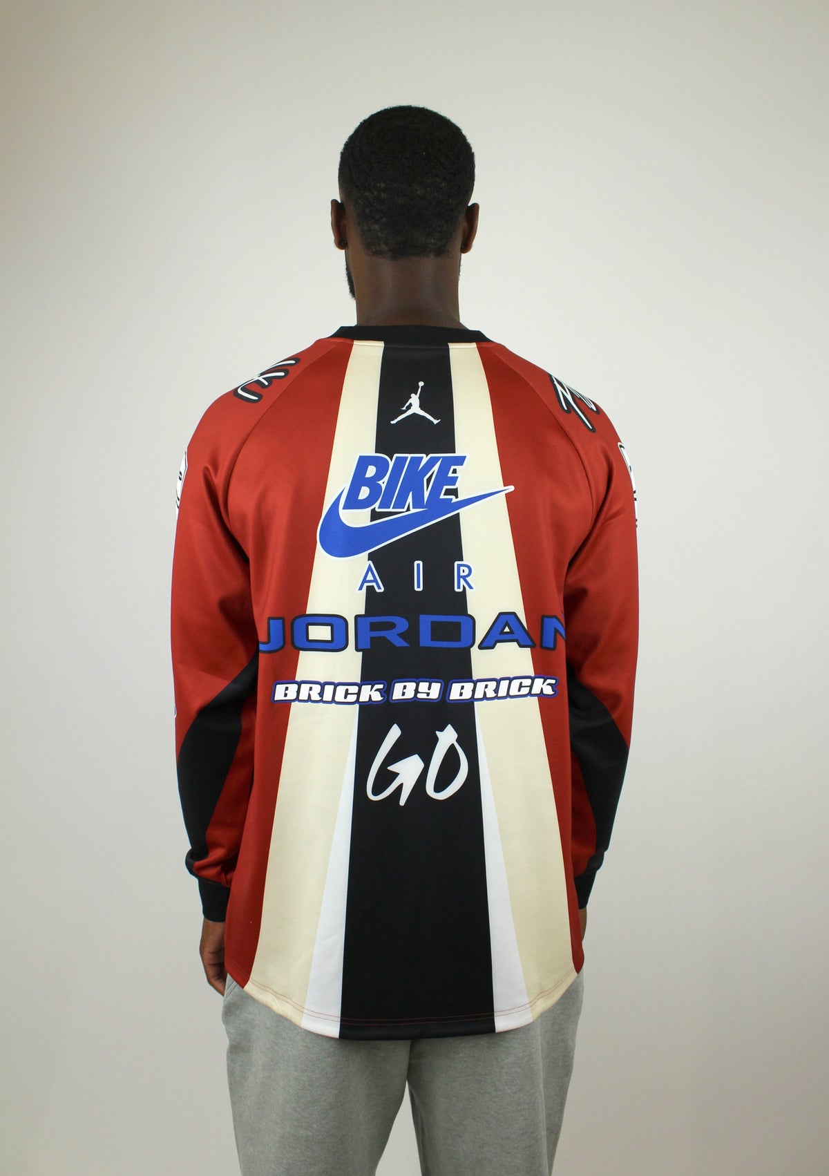 Jordan x Nigel Sylvester BMX Jersey ‘Cinnabar Red Black’